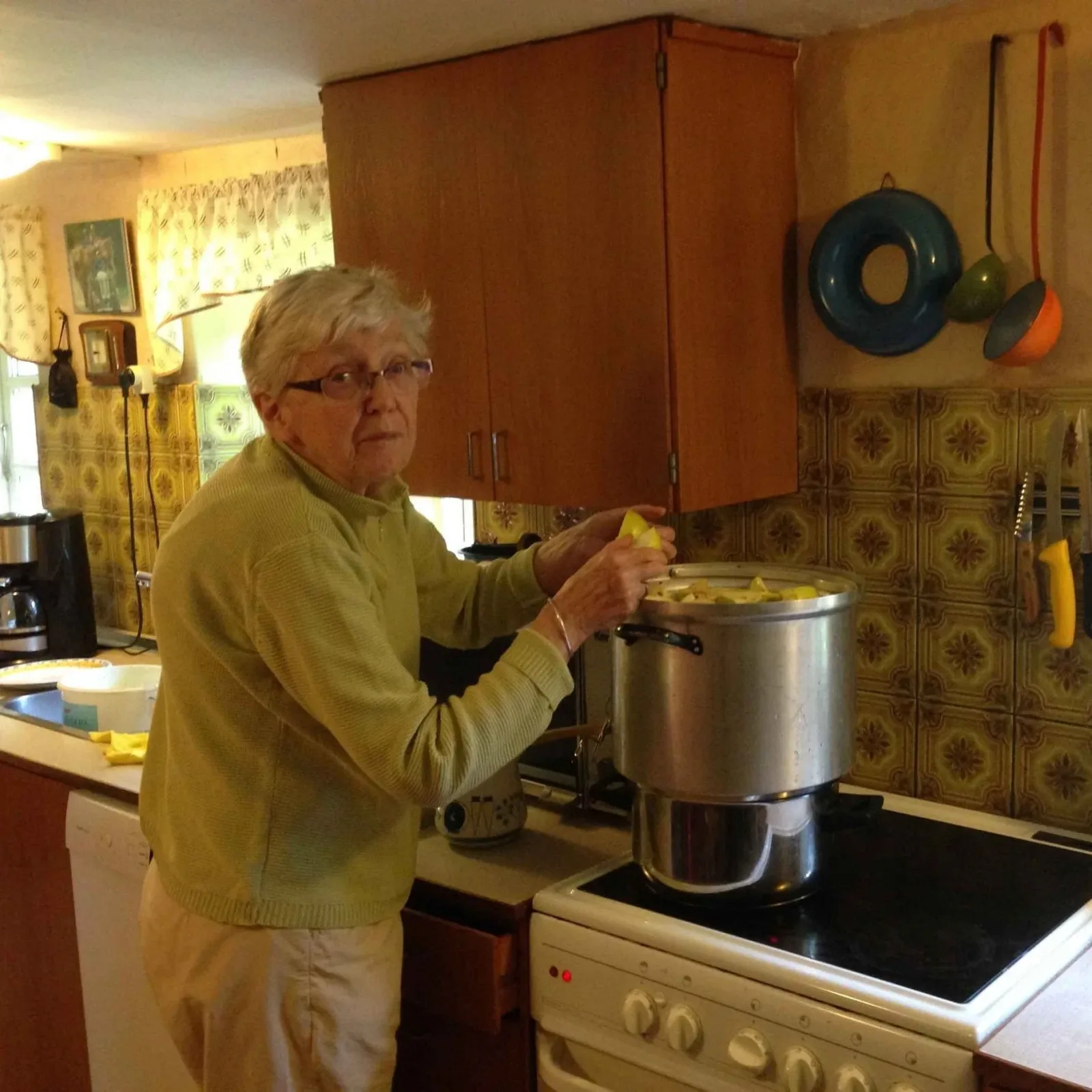 Mette’s mum cooking in the kitchen of the family farm in Denmark