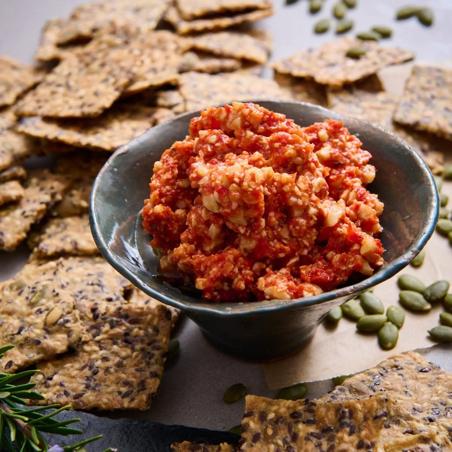 Bowl of sun-dried tomato, capsicum and parmesan dip