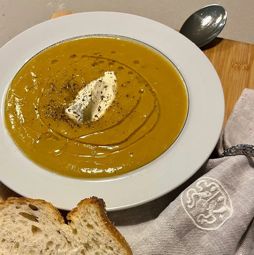 A bowl of pumpkin soup for a cosy winter meal on a cold night